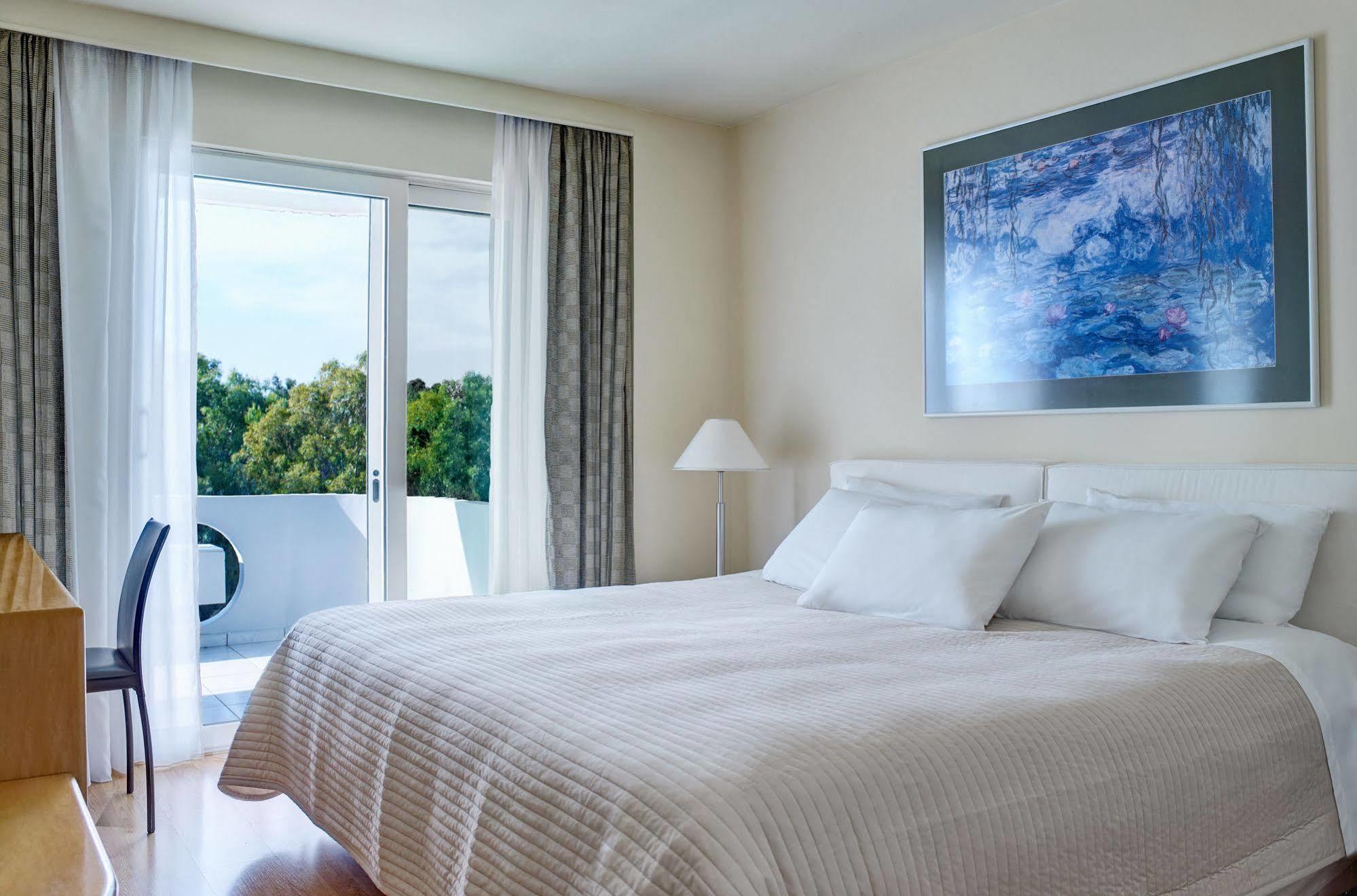 Blazer Suites Hotel Atena Exterior foto