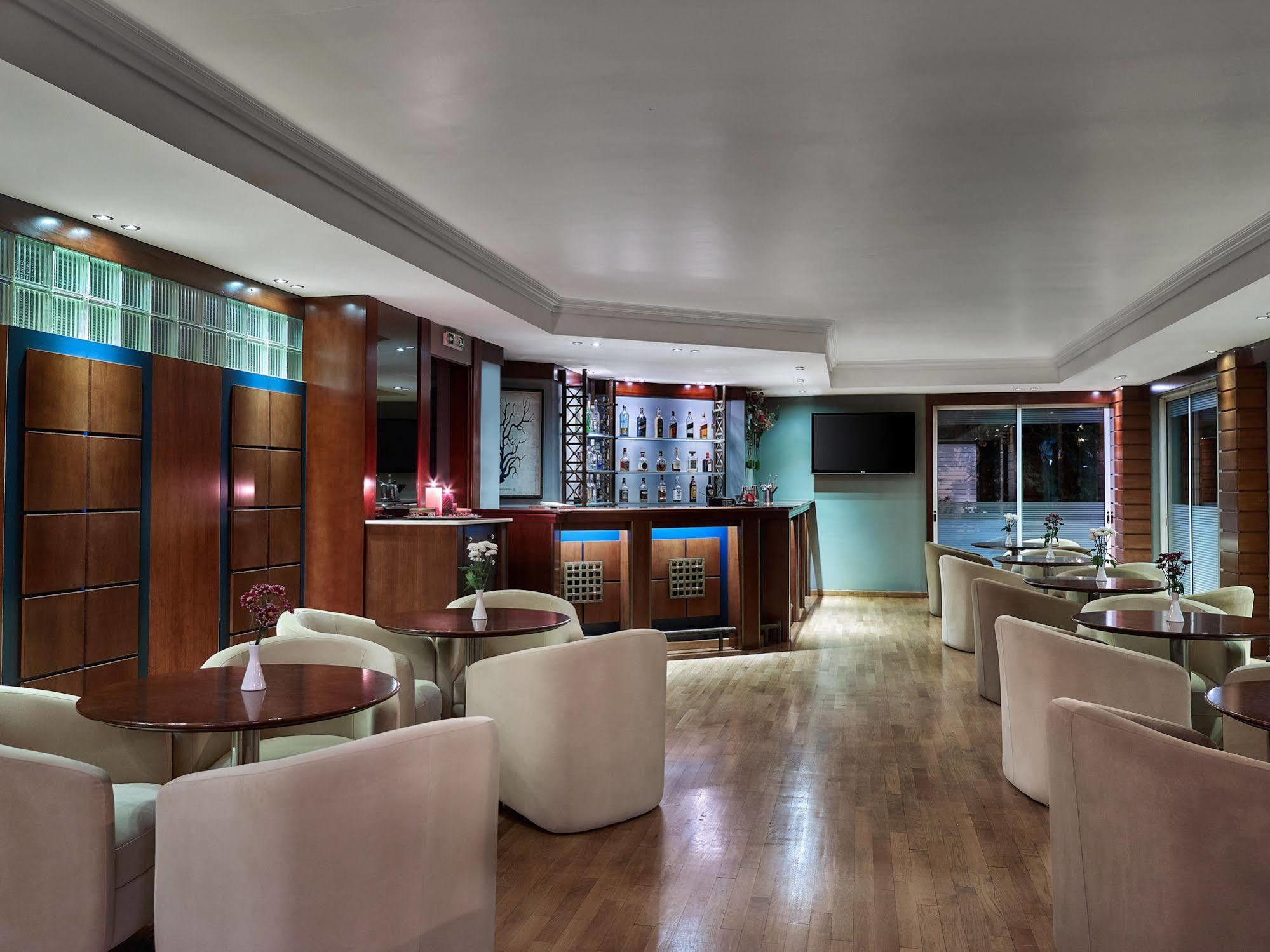 Blazer Suites Hotel Atena Exterior foto
