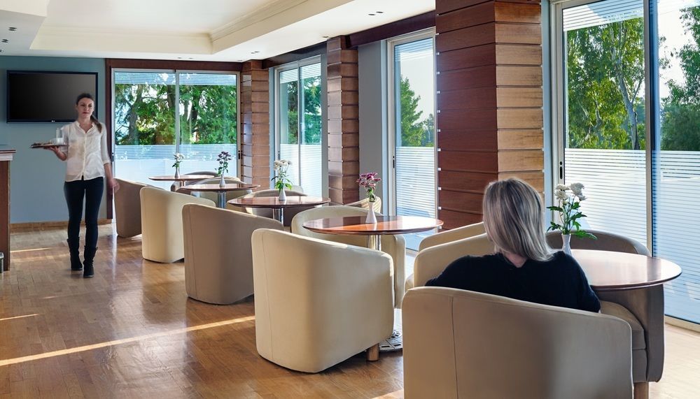 Blazer Suites Hotel Atena Exterior foto