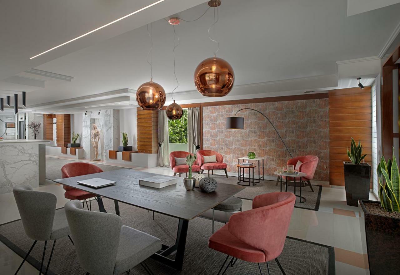 Blazer Suites Hotel Atena Exterior foto
